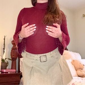 Free People size M burgundy bodysuit with bell sleeves and open back